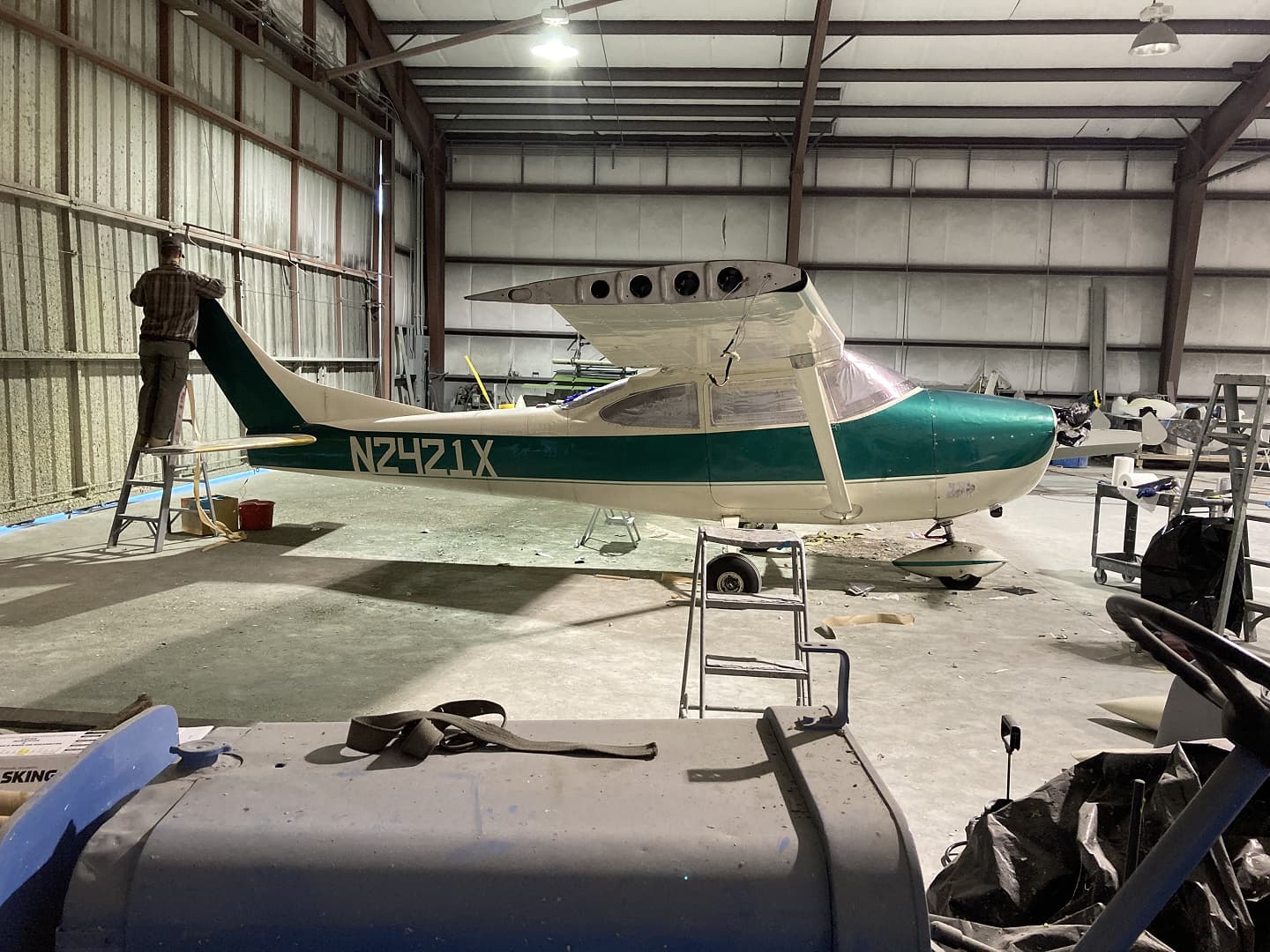 Restored utility aircraft with durable finish